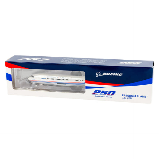 Perfect for collectors and aviation fans, the BOEING 737-700 Freedom Plane 1:200 Model comes in blue, white, and red packaging with BOEING branding and "250 Boeing Backs America" on the box.