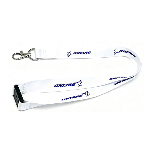 Celebrate 15 years of innovation with the Boeing 787 Dreamliner 15 Year Anniversary Lanyard by BOEING—a white aviation lanyard featuring BOEING and logo printed in blue, a metal swivel clasp, and a black plastic buckle attachment—an ideal pilot lanyard inspired by the pioneering spirit of the Dreamliner.