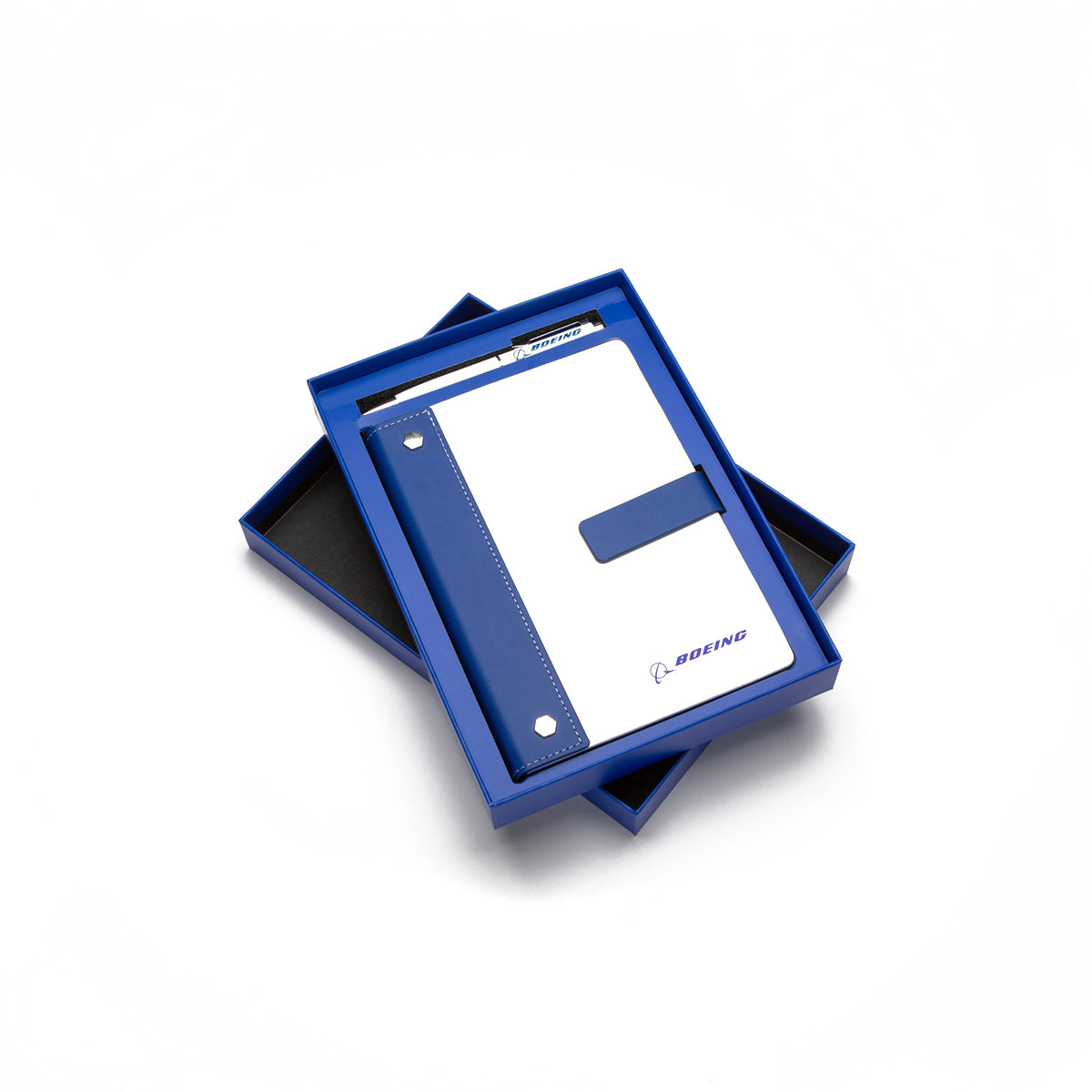 The Boeing Signature Logo Notebook Pen Set by BOEING features a white and blue PU leather notebook and pen in a matching blue gift box with the lid partially removed, set against a white background.
