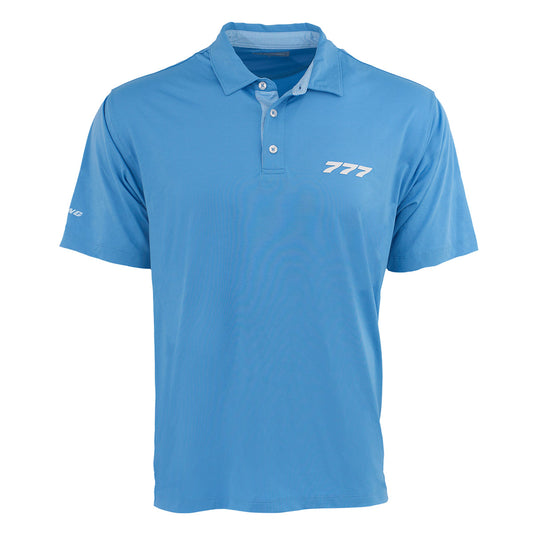 The Boeing 777 Series Men’s Polo by BOEING is a light blue, moisture-wicking shirt with short sleeves, a collar, and three buttons. It features 777 printed in white on the left chest and Boeing on the left sleeve.