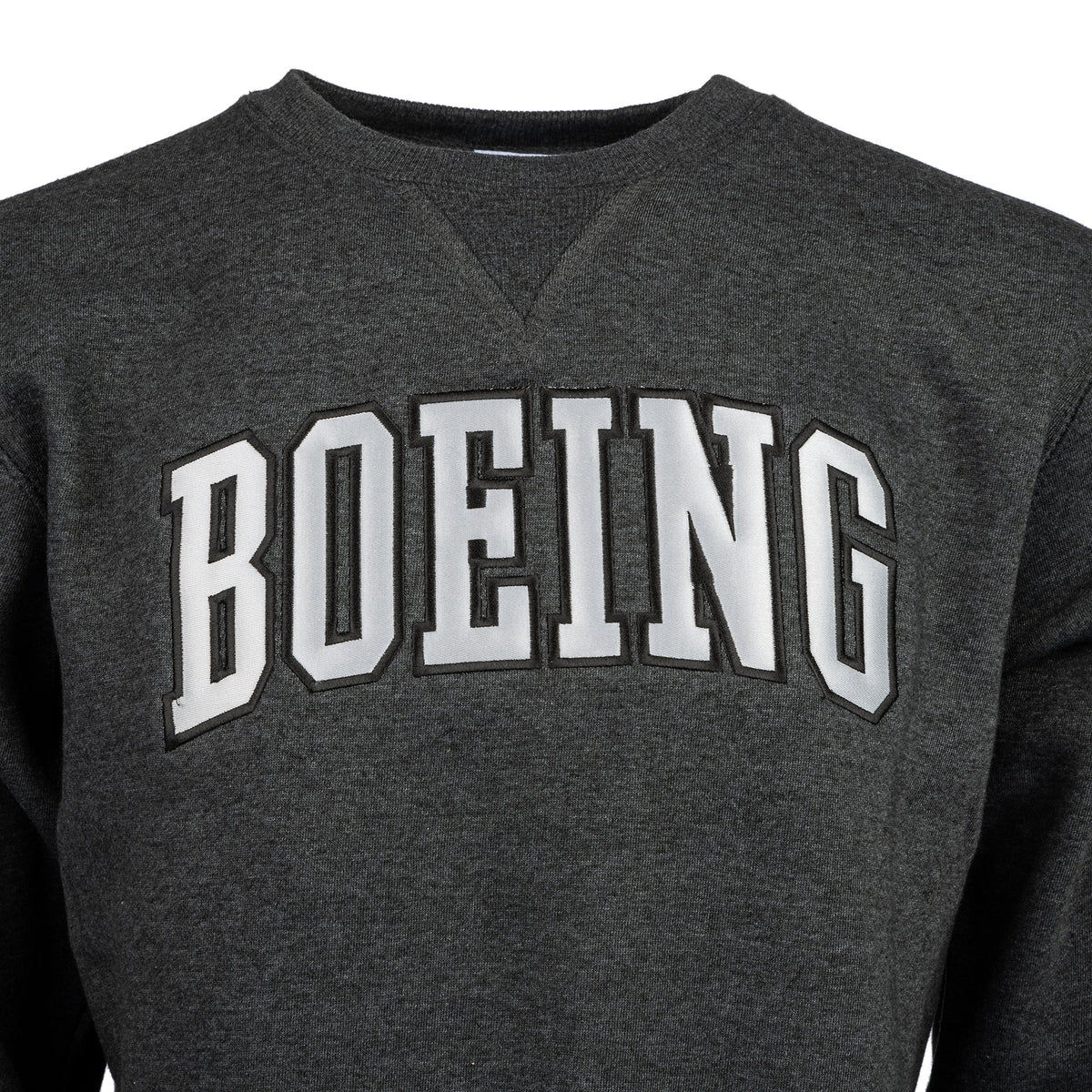 Close up image of the adult crewneck sweater in heather charcoal color.  Silver Boeing varsity logo across the chest.