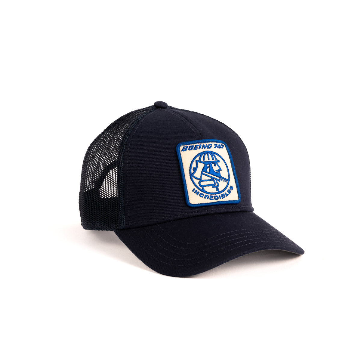 The Boeing Store offers the Boeing Vintage 747 Incredibles Hat, a navy mesh trucker cap with a vintage logo patch. It features a white patch accented in blue and yellow with an airplane graphic and bold text: Boeing 747 INCREDIBLE.