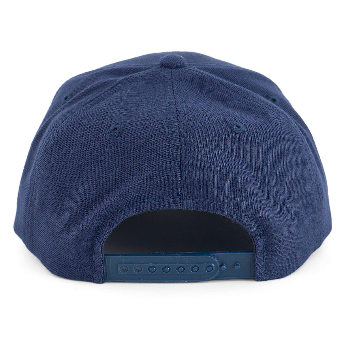 The Boeing Store’s Boeing Varsity Snapback Hat in navy blue is shown from the back, highlighting its classic curved shape and adjustable snapback closure with multiple holes—an aviation-inspired accessory.