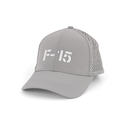 The BOEING F-15 Eagle Series Hat is gray with a white F-15 logo on the front and perforated back panels for ventilation. Displayed on a white background.