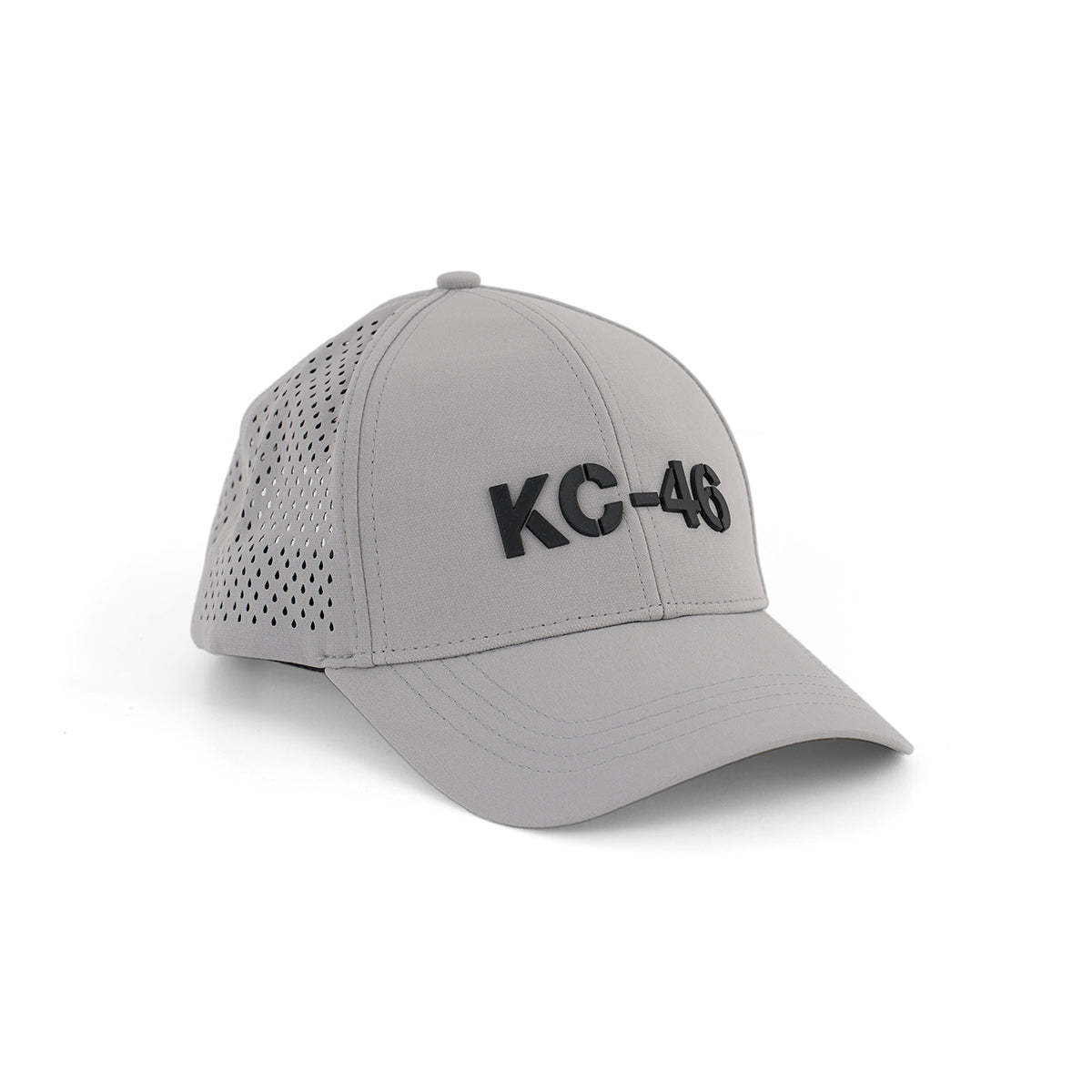 The Boeing KC-46A Pegasus Series Hat by BOEING is a light gray baseball cap with a raised black 3D KC-46 logo on the front and perforated side panels for breathability.