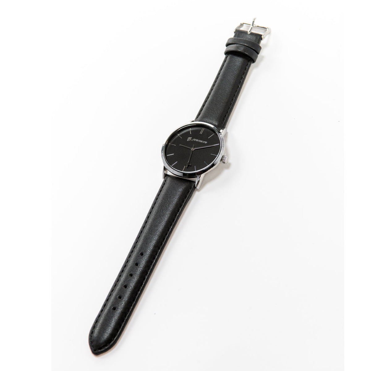 The Boeing Silver Rotating Airplane Watch showcases a sleek mens design with a black leather strap and watch face, featuring distinctive silver markers and hands reminiscent of Boeing precision. It rests elegantly against a plain white surface.