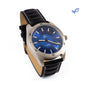 The Boeing Store’s Boeing Symbol Men's Solar Watch 42 mm features a blue face, silver bezel, white hour markers, and a black leather AppleSkin strap. The watch is angled to display its face and strap, with a small blue leaf logo at the top right.