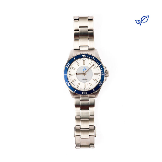 The Boeing Symbol Men's Stainless Steel Solar Watch (42.5 mm) by The Boeing Store, featuring a blue bezel and white dial, is centered on a white background with a simple blue leaf logo in the top right corner.