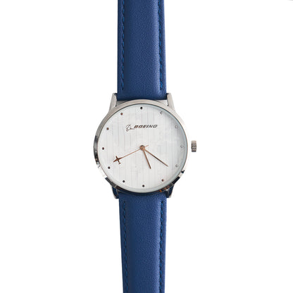 The Boeing Men's Rotating Watch White Dial by BOEING features a white face, silver casing, blue leather strap, minimalist dial with the Boeing logo, silver and brown hands, and reliable Japan quartz movement.