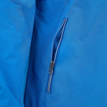 Close-up of a blue Boeing Newport Womens Jacket by The Boeing Store showing a partially open zippered pocket. It features a smooth, slightly shiny fabric with breathable TPU membrane, and the silver zipper has a small pull tab.