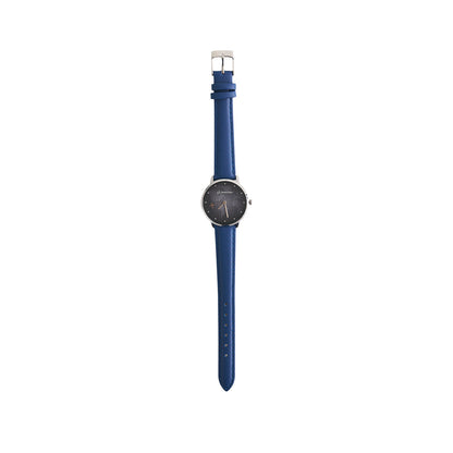 The Boeing Women's Rotating Watch by BOEING features a black dial with minimal markings, Japan quartz movement, and is paired with a textured blue leather strap, shown upright against a white background.
