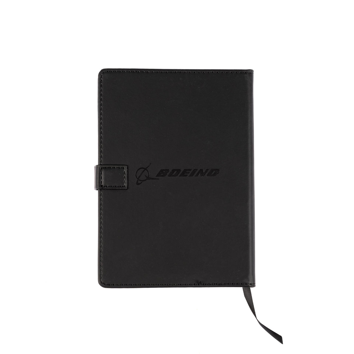 The Boeing Store’s Boeing 737 MAX Notebook is a closed black PU hardcover notebook with a clasp, embossed Boeing logo, subtle aircraft shape design on the front, and a black ribbon bookmark extending from the bottom.