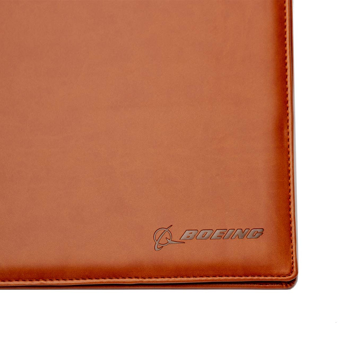 Close-up of the Boeing Basic Padfolio from The Boeing Store, featuring brown PU leather and the embossed Boeing logo in the lower right corner.
