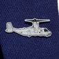 The Boeing Stores silver tone Boeing Illustrated V-22 Lapel Pin, resembling a military aircraft and enhanced with an epoxy finish, is attached to a dark blue suit fabric.