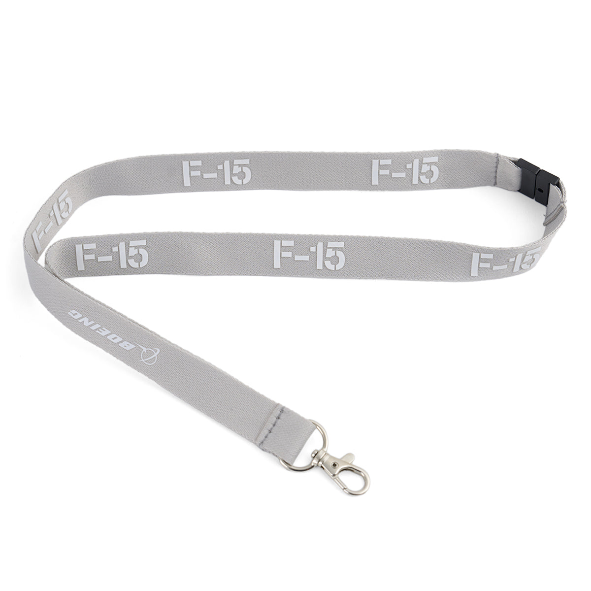 The Boeing F-15 Eagle Series Lanyard by BOEING is gray with a metal clip and features F-15 and BOEING printed in white.