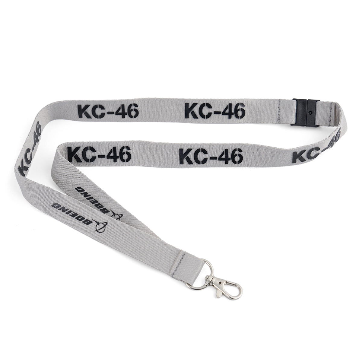 The Boeing KC-46A Pegasus Series Lanyard by BOEING is a gray aviation lanyard with a metal clip, featuring “KC-46” and the Boeing logo in black along its length.