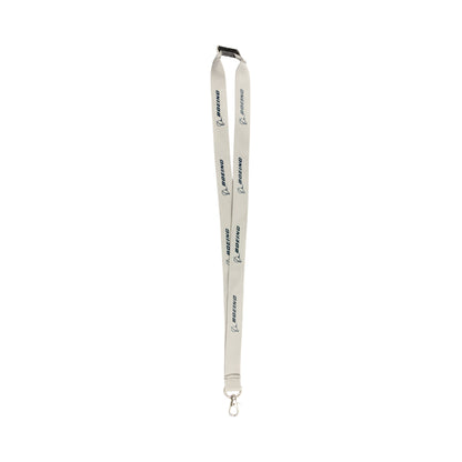 Introducing the Boeing 767 Series Lanyard by BOEING: This gray lanyard showcases the blue BOEING logo printed repeatedly along its length. It features a black plastic safety buckle at the top and a silver metal swivel clip at the bottom. Ideal for aviation enthusiasts, this lanyard is presented against a plain white background.