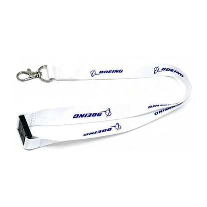 Celebrate 15 years of innovation with the Boeing 787 Dreamliner 15 Year Anniversary Lanyard by BOEING—a white aviation lanyard featuring BOEING and logo printed in blue, a metal swivel clasp, and a black plastic buckle attachment—an ideal pilot lanyard inspired by the pioneering spirit of the Dreamliner.