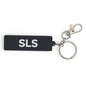 The BOEING Space Launch System Series Keychain features a black rectangular PVC design with white SLS lettering, a silver keyring, and metal clasp—an ideal accessory for aviation enthusiasts.