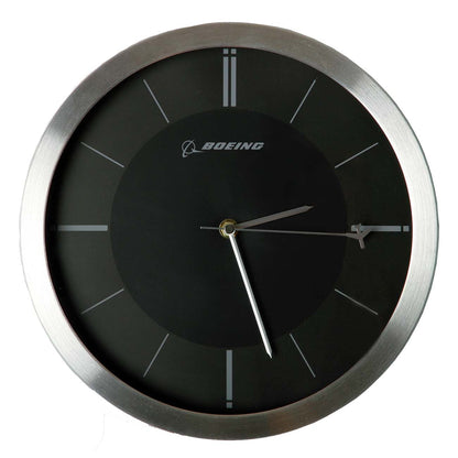 The Boeing Rotating Plane Clock from The Boeing Store features a metallic rim, black face, and Boeing logo. Its airplane design shows the time as 4:29.