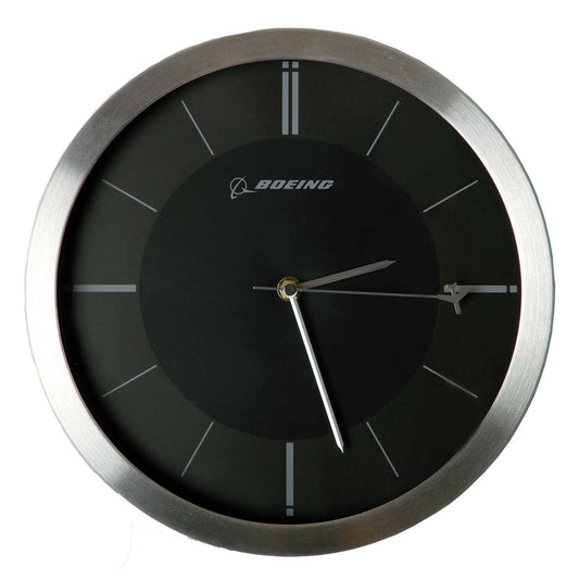 The Boeing Rotating Plane Clock from The Boeing Store features a metallic rim, black face, and Boeing logo. Its airplane design shows the time as 4:29.