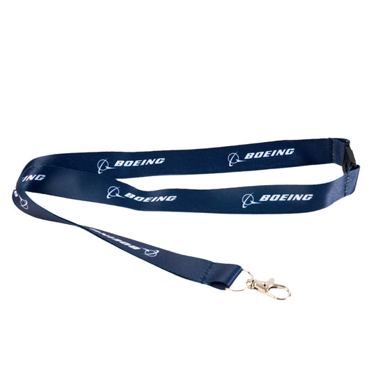 The Boeing Store's Boeing Sustainable Lanyard is made from recycled plastic bottles, features a navy blue color with the name in white, and includes a metal clasp for attaching items.