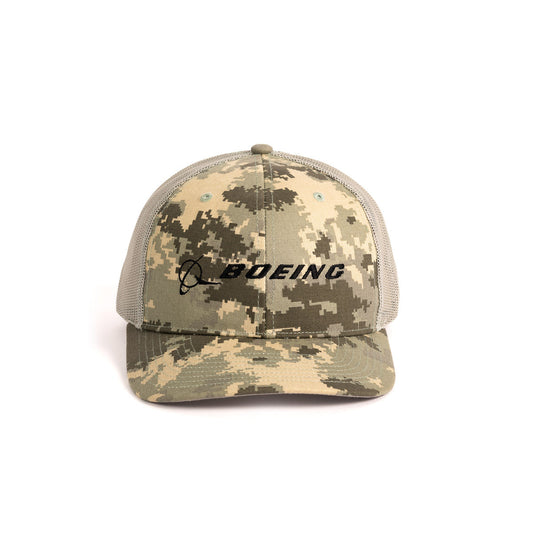 The Boeing Signature Logo Digital Camo Trucker Hat from The Boeing Store features a digital camo print, mesh back, adjustable snapback, black embroidered logo on the structured front panel, and a curved brim in green and beige.